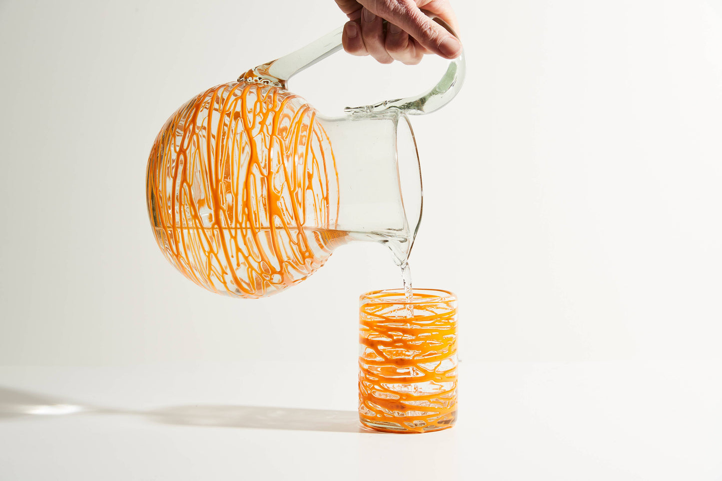 Handblown Glass Pitcher-Orange Swirl